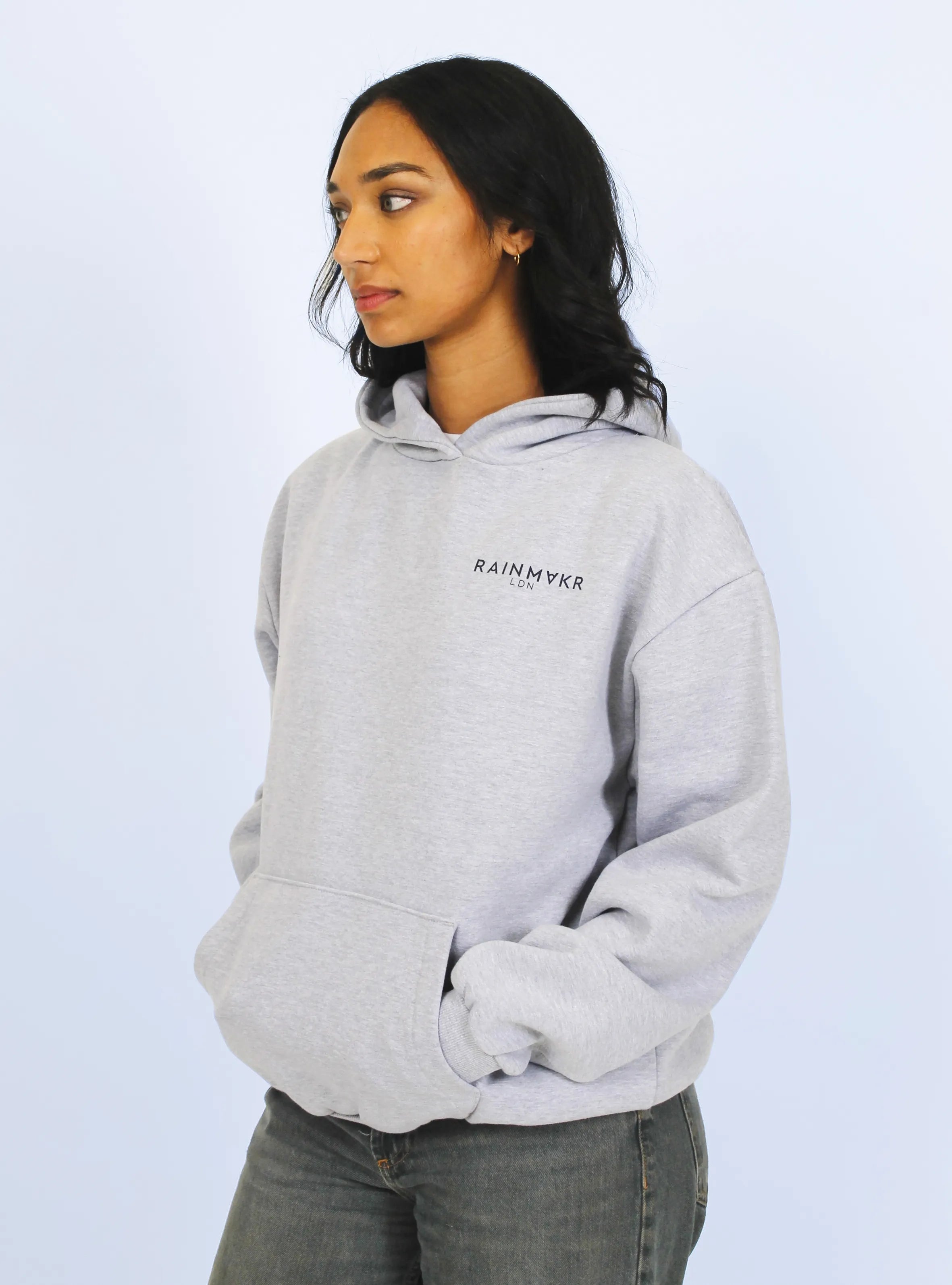 Close-up of Miami cityscape back print on grey hoodie