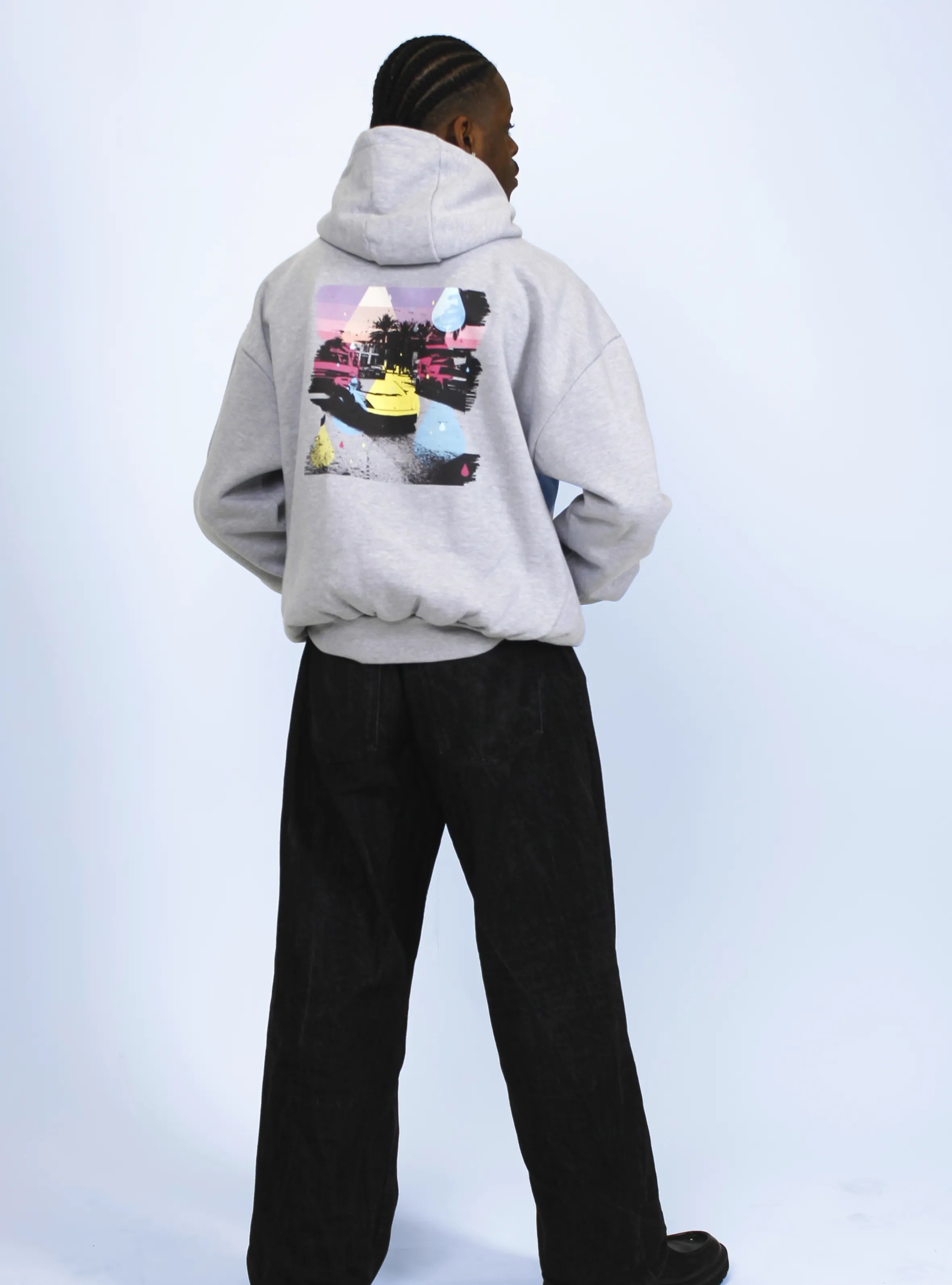 Close-up of Miami cityscape back print on grey hoodie